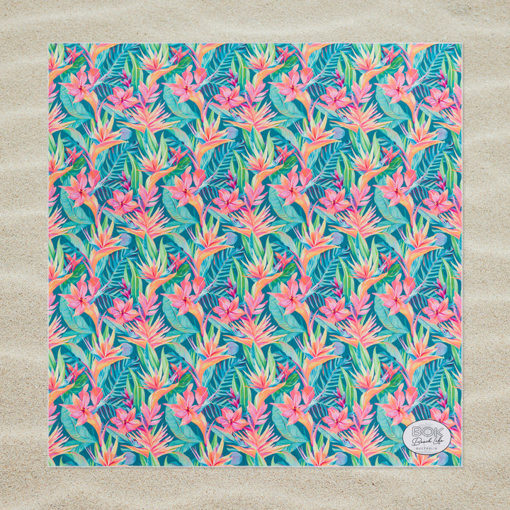 Tropical birds of paradise patterned sand free beach blanket on a sand background